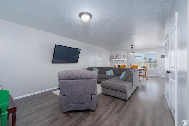 583 E 2680 S, Vernal, UT 84078 - living room with dark wood-type flooring, a textured ceiling, and baseboards