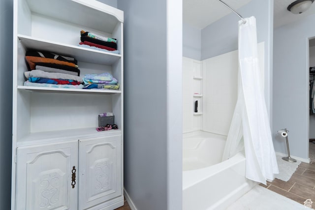 583 E 2680 S, Vernal, UT 84078 - bathroom with shower / tub combo and baseboards