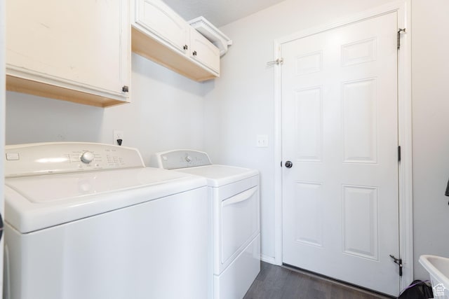 583 E 2680 S, Vernal, UT 84078 - laundry area featuring dark wood-style floors, cabinet space, and washer and clothes dryer