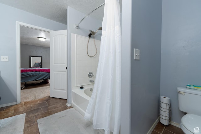 583 E 2680 S, Vernal, UT 84078 - bathroom with shower / bath combo with shower curtain, a textured ceiling, baseboards, and toilet