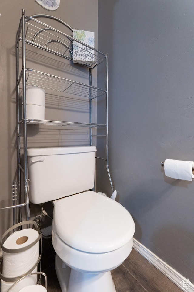 583 E 2680 S, Vernal, UT 84078 - bathroom with toilet, baseboards, and wood finished floors