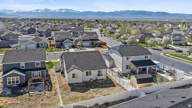 birds eye view of property with a residential view and a mountain view