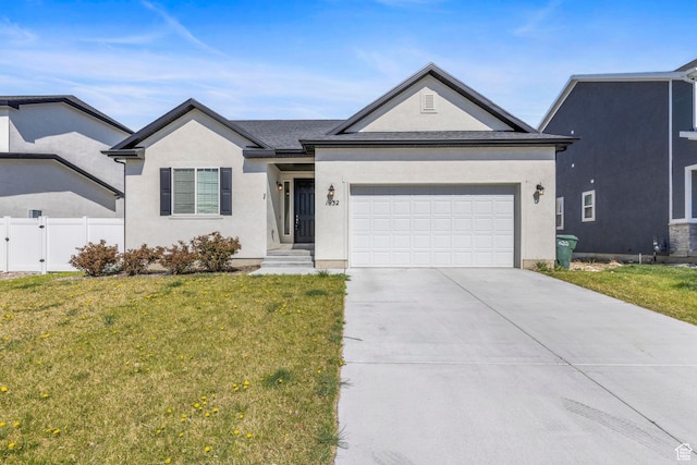 ranch-style home featuring stucco siding, a front yard, fence, an attached garage, and concrete driveway