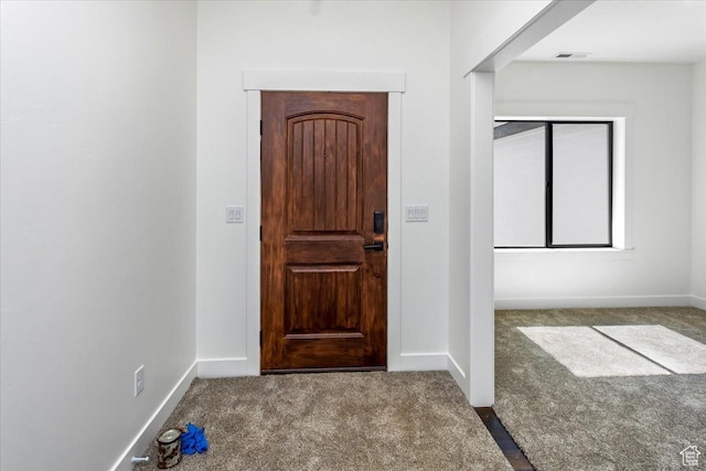 432 Tee Cir, Preston, ID 83263 - carpeted foyer entrance featuring baseboards and visible vents