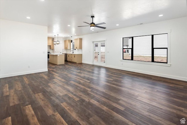 432 Tee Cir, Preston, ID 83263 - unfurnished living room featuring ceiling fan, dark wood finished floors, recessed lighting, a sink, and baseboards