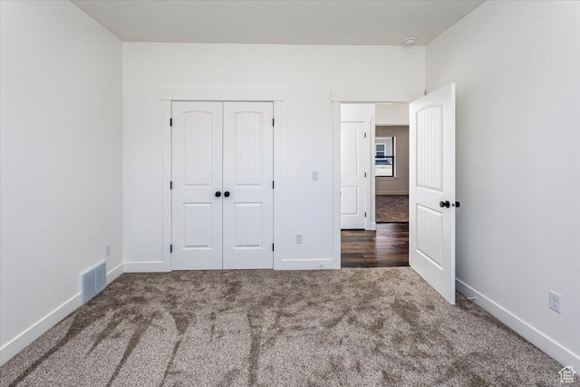 432 Tee Cir, Preston, ID 83263 - unfurnished bedroom with a closet, baseboards, visible vents, and carpet floors