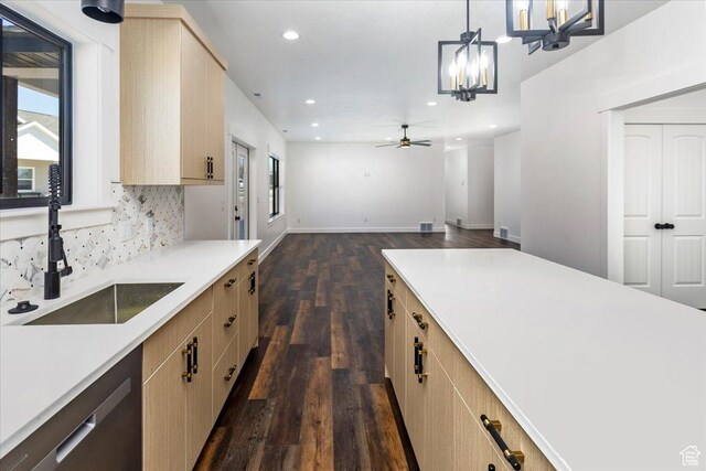 432 Tee Cir, Preston, ID 83263 - kitchen featuring dark wood finished floors, light brown cabinetry, recessed lighting, light countertops, and a sink