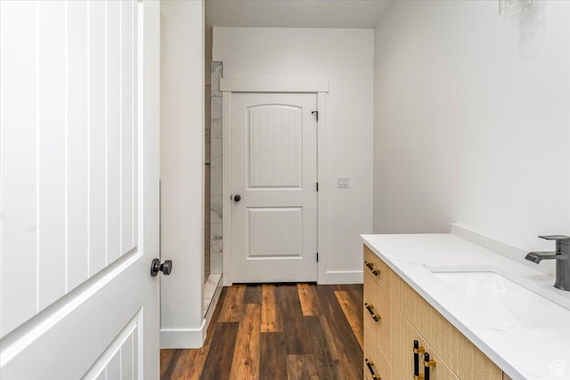 432 Tee Cir, Preston, ID 83263 - full bathroom with tiled shower, vanity, and wood finished floors