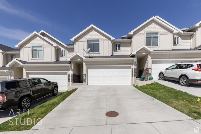 790 E Ruby Dr, Morgan, UT 84050 - multi unit property featuring board and batten siding, an attached garage, stone siding, and concrete driveway