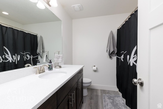 790 E Ruby Dr, Morgan, UT 84050 - full bath featuring toilet, baseboards, vanity, and wood finished floors