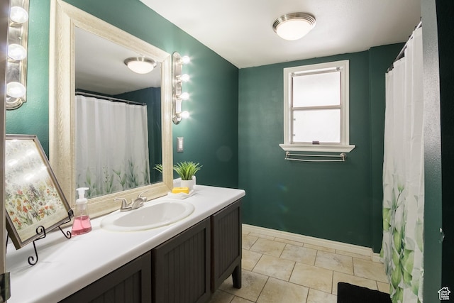 1370 S 1900 E, Vernal, UT 84078 - bathroom featuring tile patterned floors, vanity, and baseboards