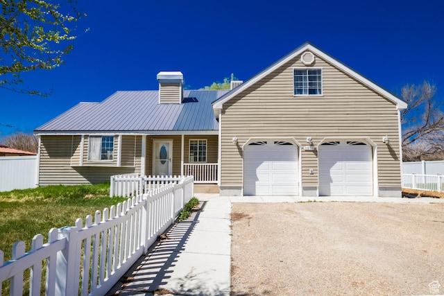 1370 S 1900 E, Vernal, UT 84078 - view of front of home featuring an attached garage, driveway, fence, and a porch