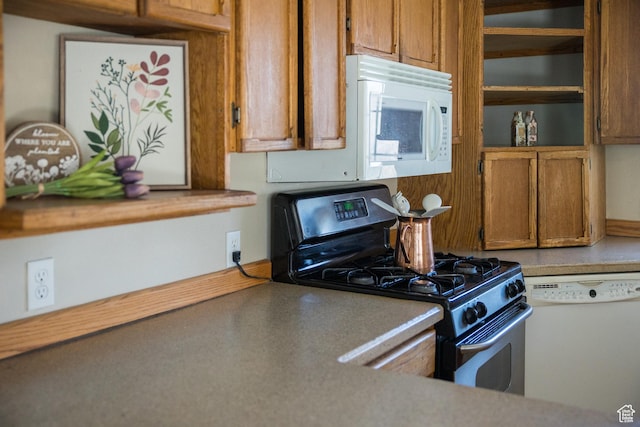 1370 S 1900 E, Vernal, UT 84078 - kitchen featuring brown cabinets, light countertops, and white appliances