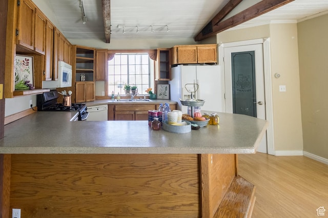 1370 S 1900 E, Vernal, UT 84078 - kitchen featuring open shelves, a sink, white appliances, a peninsula, and rail lighting