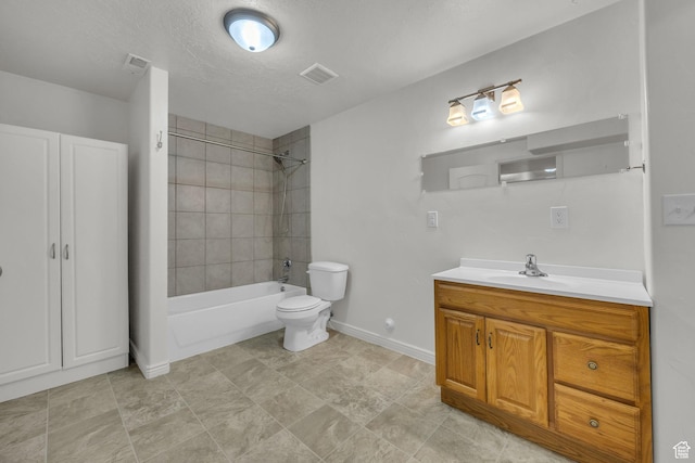 full bath featuring vanity, baseboards, toilet, visible vents, and tub / shower combination