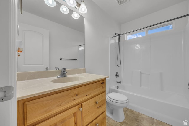 full bath featuring vanity, tile patterned floors, toilet, visible vents, and shower / bathing tub combination