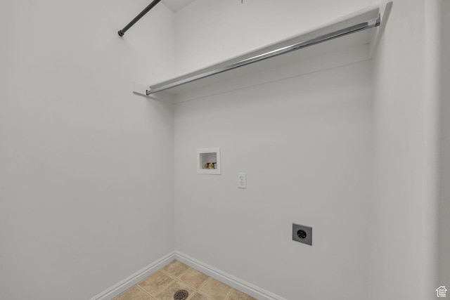 laundry room featuring light tile patterned floors, baseboards, washer hookup, laundry area, and electric dryer hookup