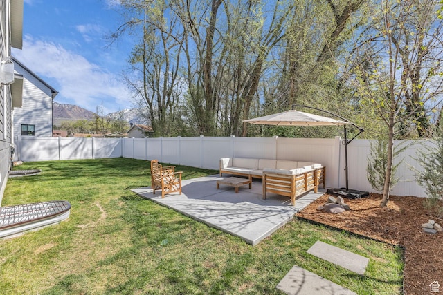 1958 E Janet Kay Ln, Holladay, UT 84121 - view of yard with a mountain view, a fenced backyard, a patio, and an outdoor hangout area
