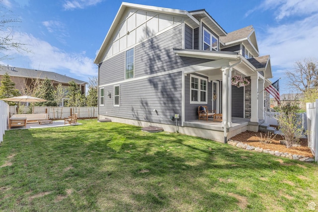 1958 E Janet Kay Ln, Holladay, UT 84121 - view of side of home featuring a patio area, a fenced backyard, board and batten siding, and a lawn
