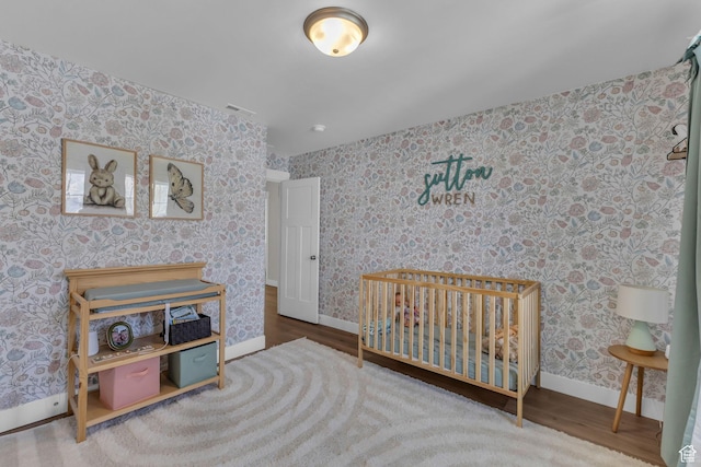 1958 E Janet Kay Ln, Holladay, UT 84121 - bedroom featuring wallpapered walls, wood finished floors, and baseboards