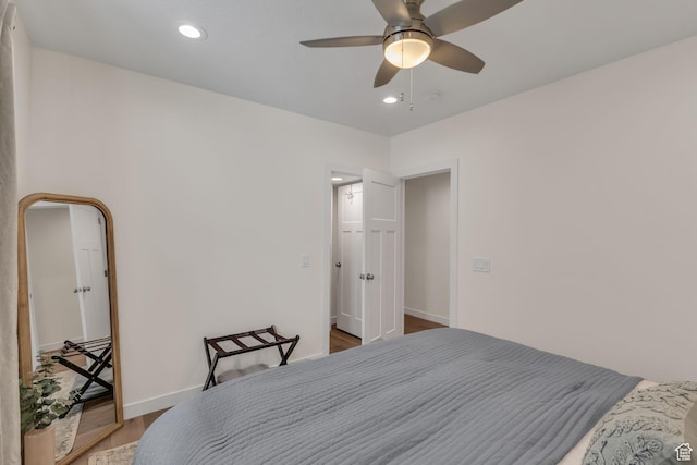 1958 E Janet Kay Ln, Holladay, UT 84121 - bedroom with wood finished floors, ceiling fan, baseboards, and recessed lighting