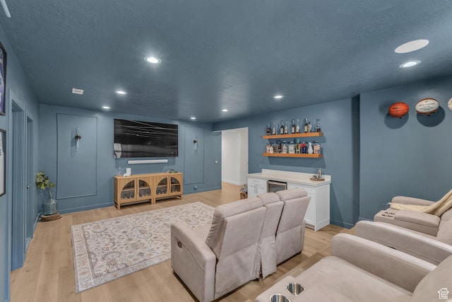 1958 E Janet Kay Ln, Holladay, UT 84121 - home theater with baseboards, recessed lighting, light wood-style floors, and indoor wet bar