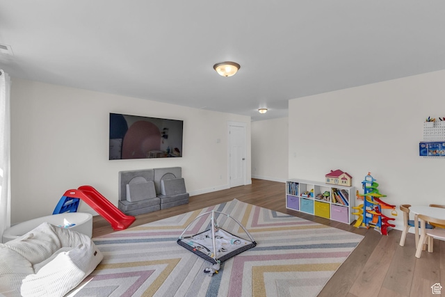 1958 E Janet Kay Ln, Holladay, UT 84121 - rec room with baseboards and wood finished floors