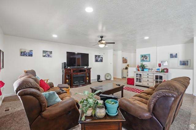 living area featuring recessed lighting, a ceiling fan, and carpet floors