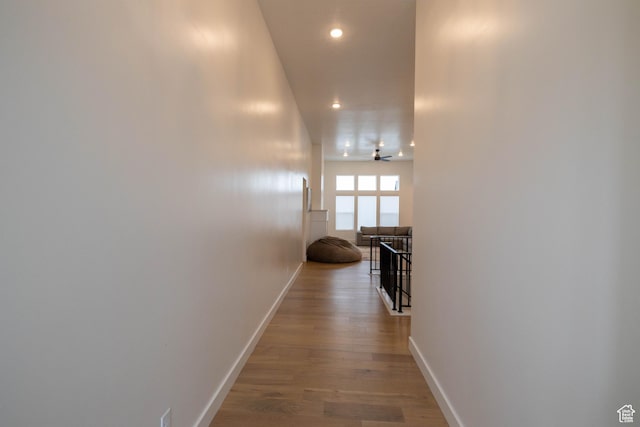 293 N Pheasant Dr, Mapleton, UT 84664 - corridor featuring wood finished floors, baseboards, an upstairs landing, and recessed lighting