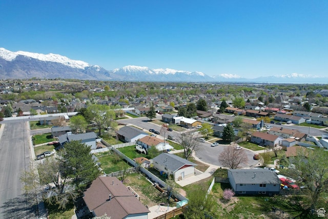 aerial view featuring a mountain view and a residential view