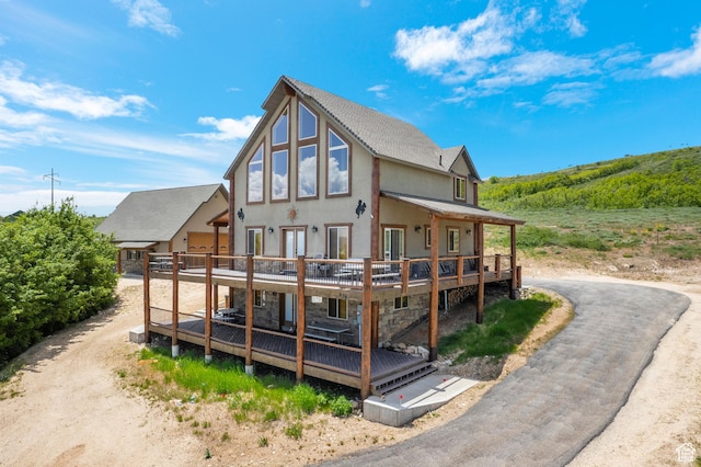 679 N Cambry Dr, Garden City, UT 84028 - back of property featuring stucco siding and a wooden deck