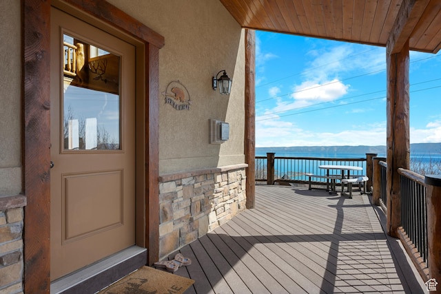 679 N Cambry Dr, Garden City, UT 84028 - wooden terrace with a water view