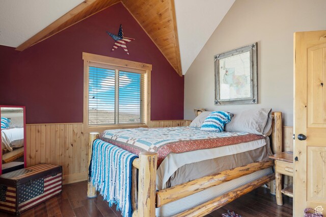 679 N Cambry Dr, Garden City, UT 84028 - bedroom featuring wainscoting, wood-type flooring, wooden walls, and vaulted ceiling