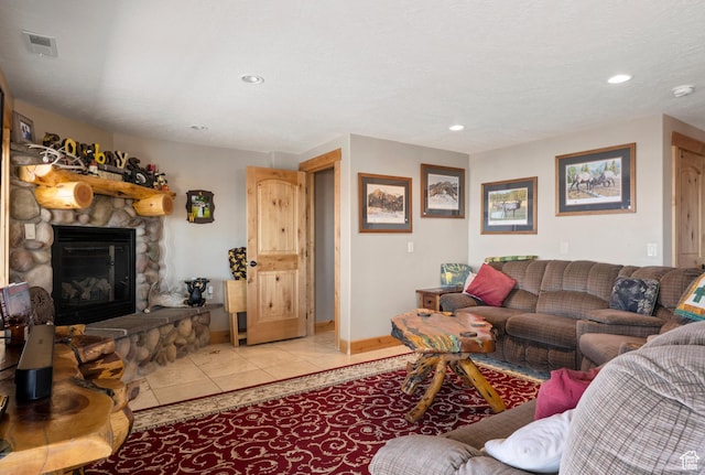 679 N Cambry Dr, Garden City, UT 84028 - living room with a fireplace, light tile patterned floors, recessed lighting, and baseboards