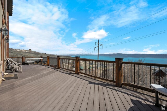 679 N Cambry Dr, Garden City, UT 84028 - wooden terrace with a water view