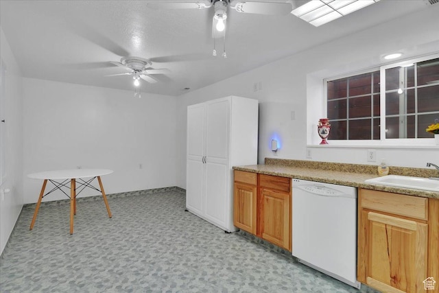 1480 N 1525 E, Logan, UT 84341 - kitchen featuring dishwasher, a sink, light floors, and ceiling fan