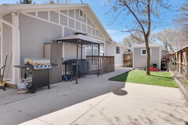 1480 N 1525 E, Logan, UT 84341 - back of property featuring an outbuilding, a storage shed, stucco siding, fence, and a gazebo