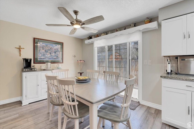 1480 N 1525 E, Logan, UT 84341 - dining room featuring light wood-type flooring, baseboards, and a ceiling fan