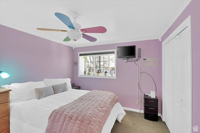 1480 N 1525 E, Logan, UT 84341 - carpeted bedroom with a closet, baseboards, a ceiling fan, and ornamental molding