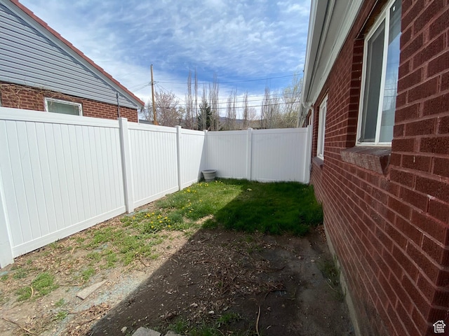 view of yard featuring a fenced backyard