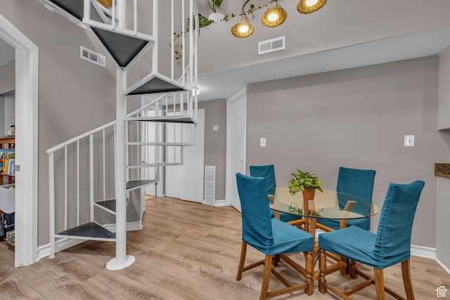 6821 N 2200 W Unit 11K, Park City, UT 84098 - dining space with wood finished floors and visible vents