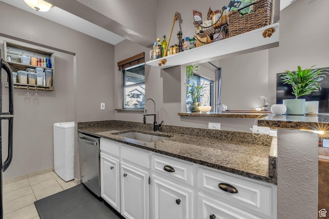 6821 N 2200 W Unit 11K, Park City, UT 84098 - kitchen featuring light tile patterned flooring, white cabinets, dark stone counters, dishwasher, and a sink