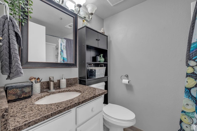 6821 N 2200 W Unit 11K, Park City, UT 84098 - full bathroom featuring toilet, vanity, a shower with shower curtain, and visible vents
