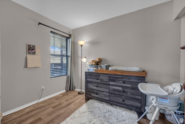6821 N 2200 W Unit 11K, Park City, UT 84098 - bedroom featuring wood finished floors and baseboards