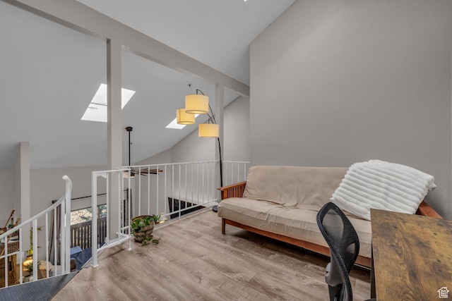 6821 N 2200 W Unit 11K, Park City, UT 84098 - sitting room with high vaulted ceiling, wood finished floors, and a skylight