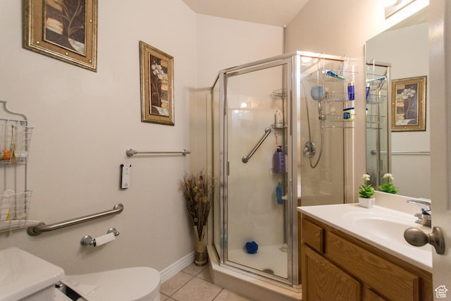 9928 S Cascade Park Dr, Sandy, UT 84070 - bathroom with vanity, baseboards, a stall shower, tile patterned floors, and toilet