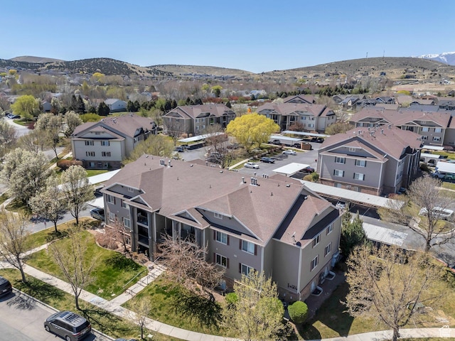 birds eye view of property with a residential view and a mountain view