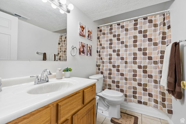 bathroom featuring a shower with curtain, vanity, visible vents, toilet, and tile patterned floors