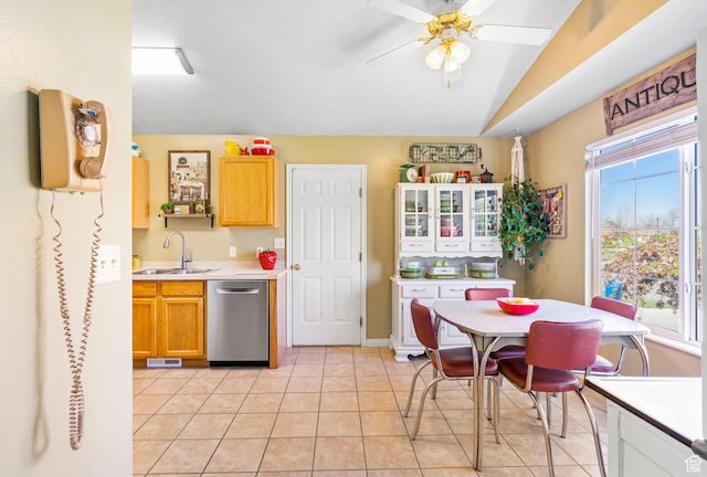 kitchen featuring visible vents, dishwasher, a sink, light countertops, and ceiling fan