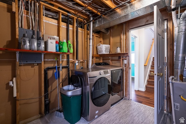 laundry room featuring washer and clothes dryer and laundry area